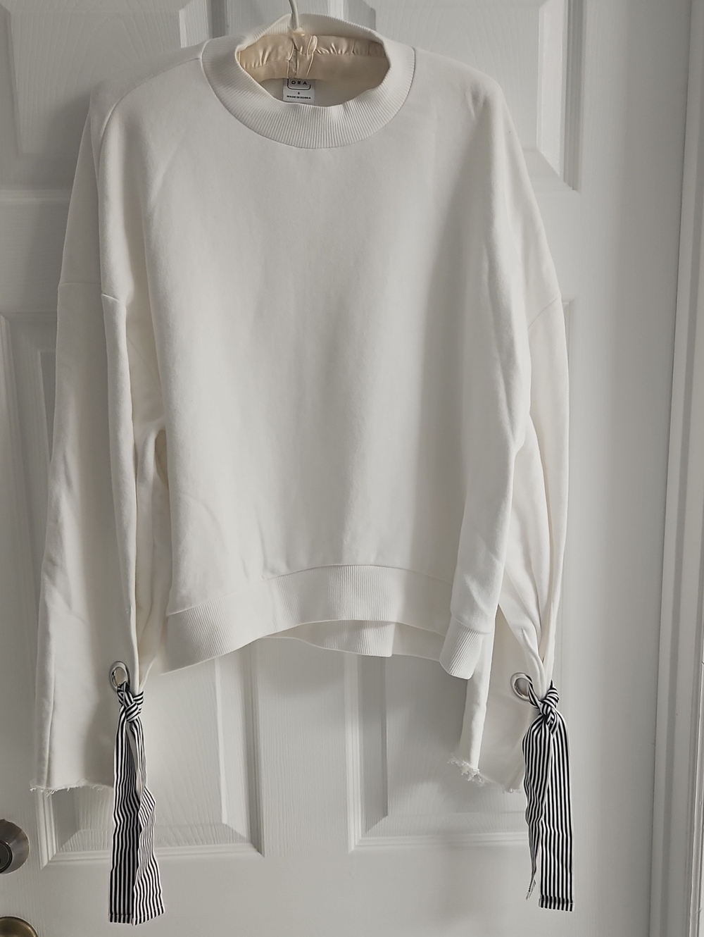 NYLORA Cream Crewneck Sweatshirt with Striped Tie Cuffs